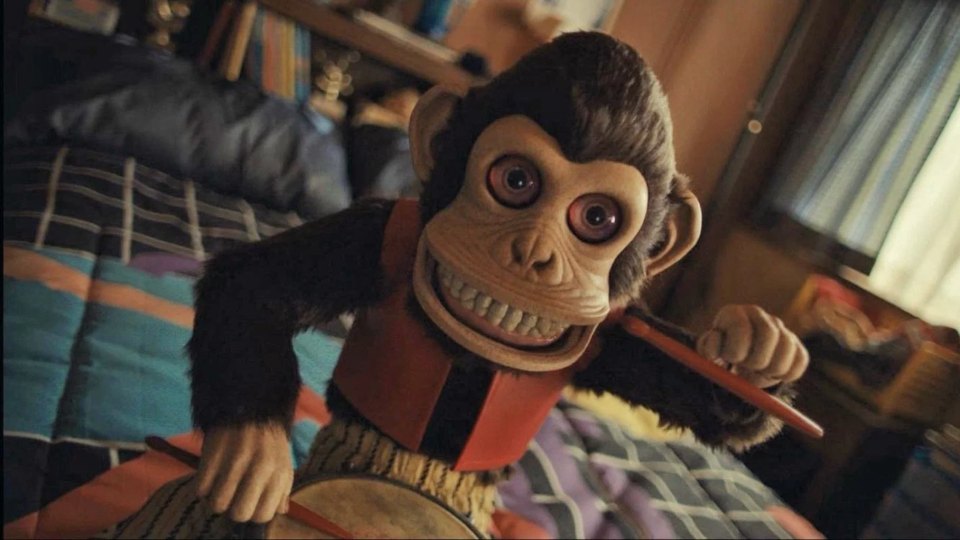 The Monkey — Laughing at the Funeral Hero Banner